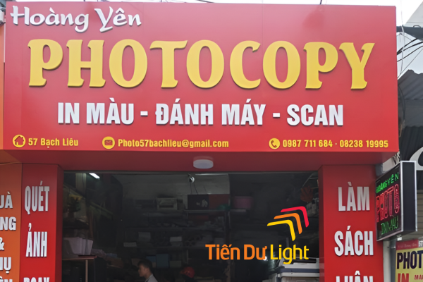 Biển vẫy được treo vuông góc mặt tiền quán photocopy
