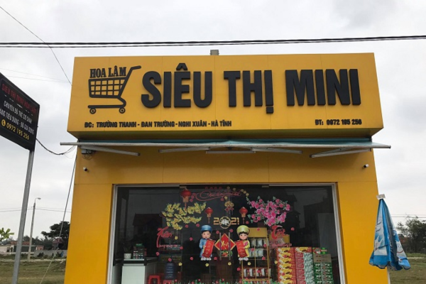 Biển quảng cáo siêu thị mini trước mặt tiền và biển vẫy 
